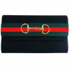 lisi+lerch+avery+black+clutch+with+ribbon+and+gold+snaffle